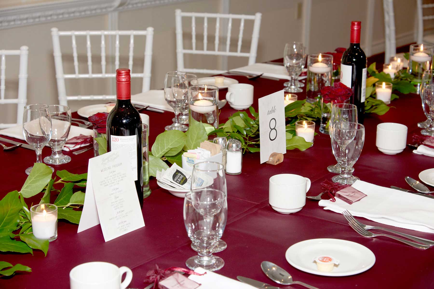 Greenery filled event with pops of Marsala