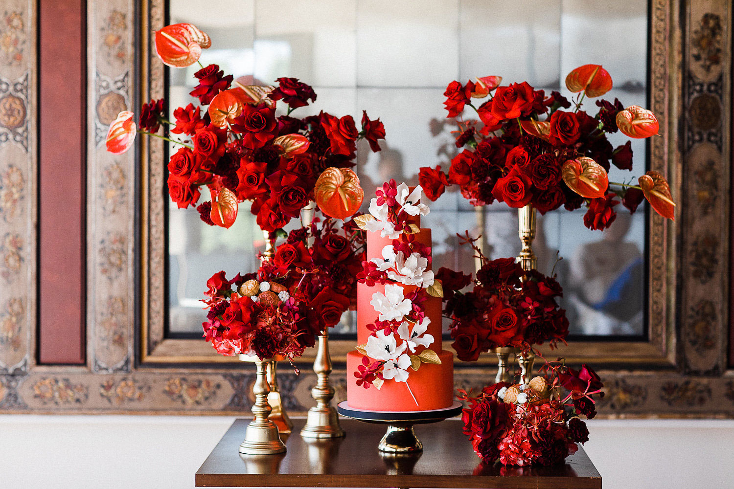 luxury wedding cake table filled with flowers