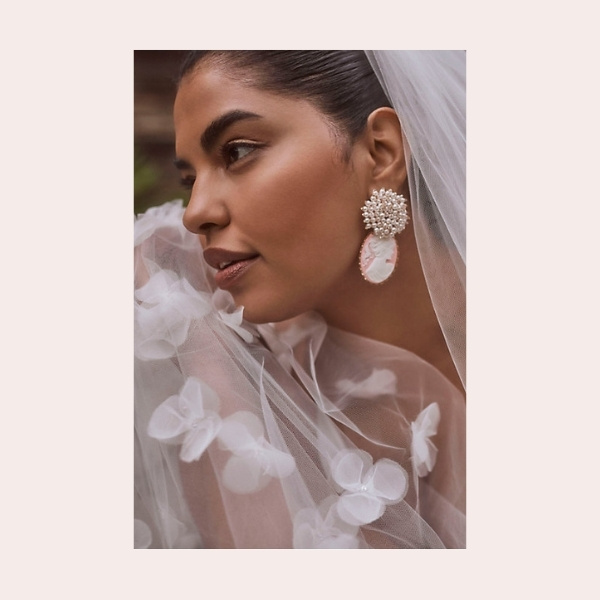 (1) Nicola Bathie Doone Earrings $150.00 | Make a statement in these pretty-in-pink cameo earrings, topped off with pearly accents.
