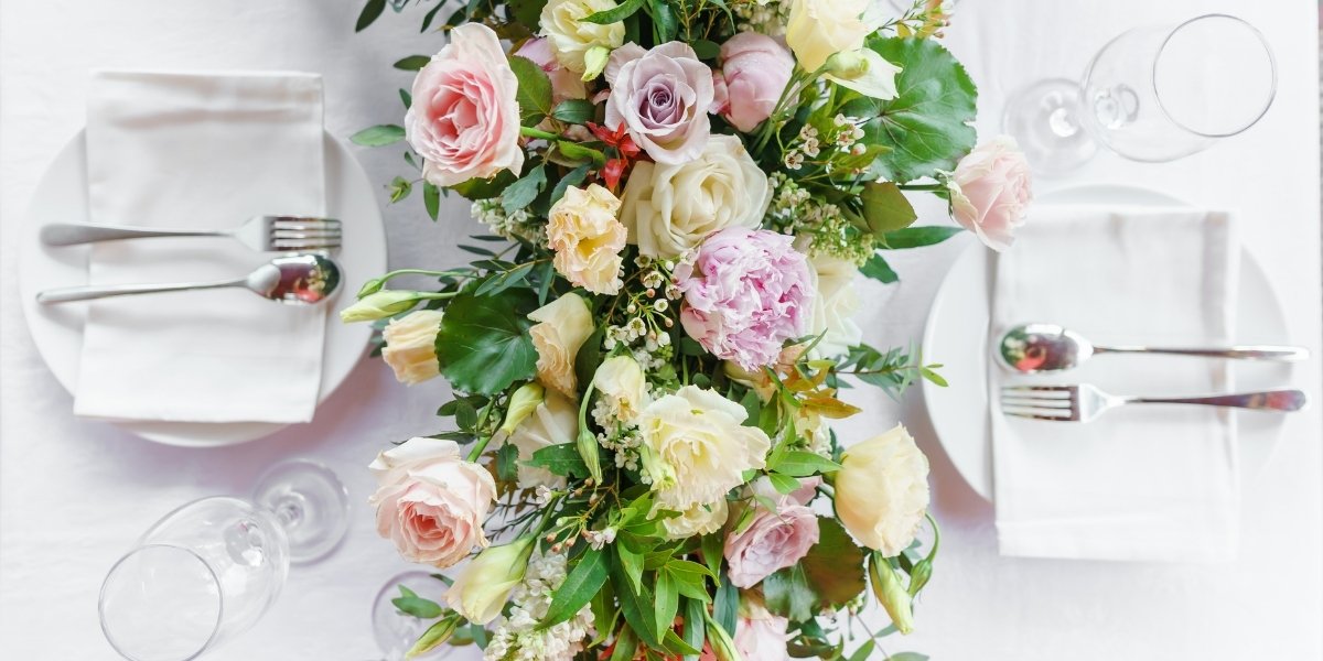 The difference when having real bouquet and fake centerpieces?