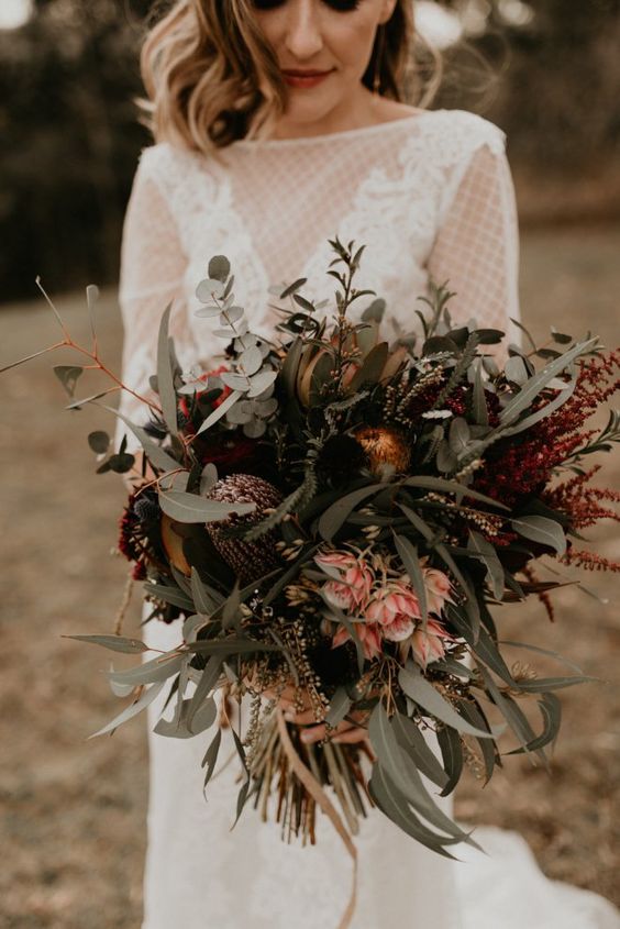 Dark and Moody Wedding Bouquet Ideas - protea and greenery